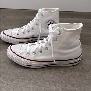 Brand new white high top converse. Mens 4.5, women 6.5.